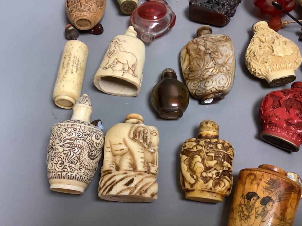 Twenty eight Chinese snuff bottles, various materials